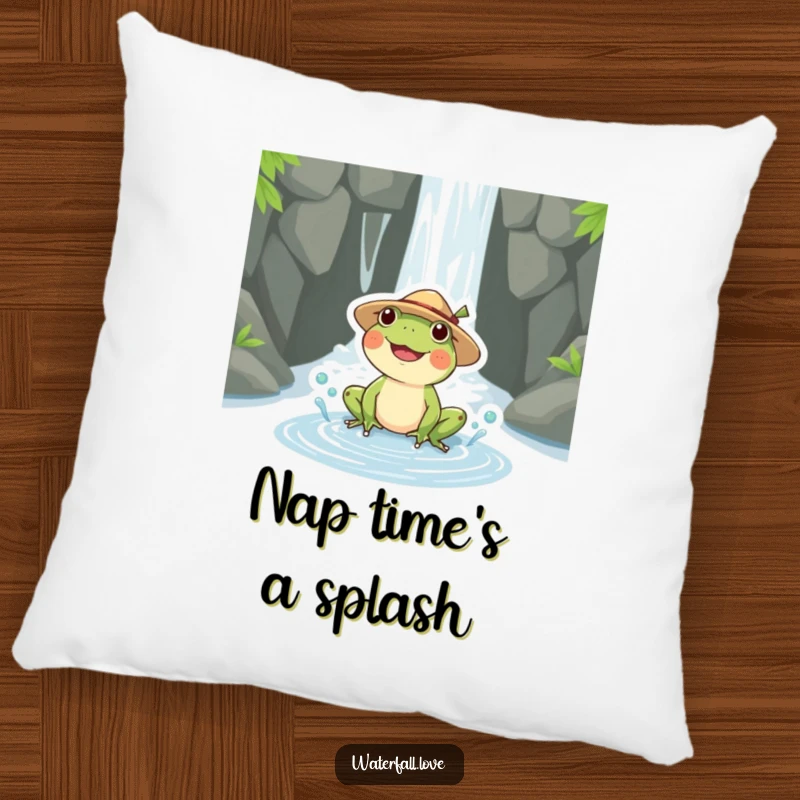 Funny frog wearing a straw hat, splashing in a puddle next to a waterfall, depicted on a soft, decorative pillow.