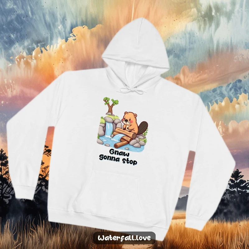 Funny beaver focused on building a dam with logs by a waterfall, printed on a warm and humorous hoodie.