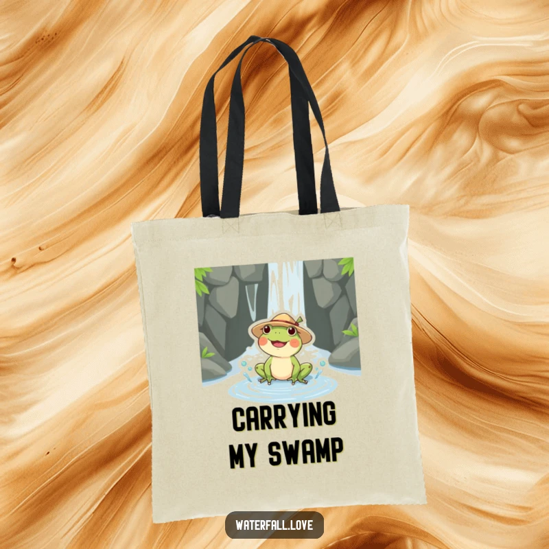 Funny frog with a straw hat splashing in a puddle near a waterfall, printed on a durable, humorous tote bag.